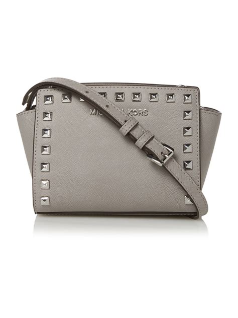 michael kors grey studded bag|Michael Kors black shoulder bag.